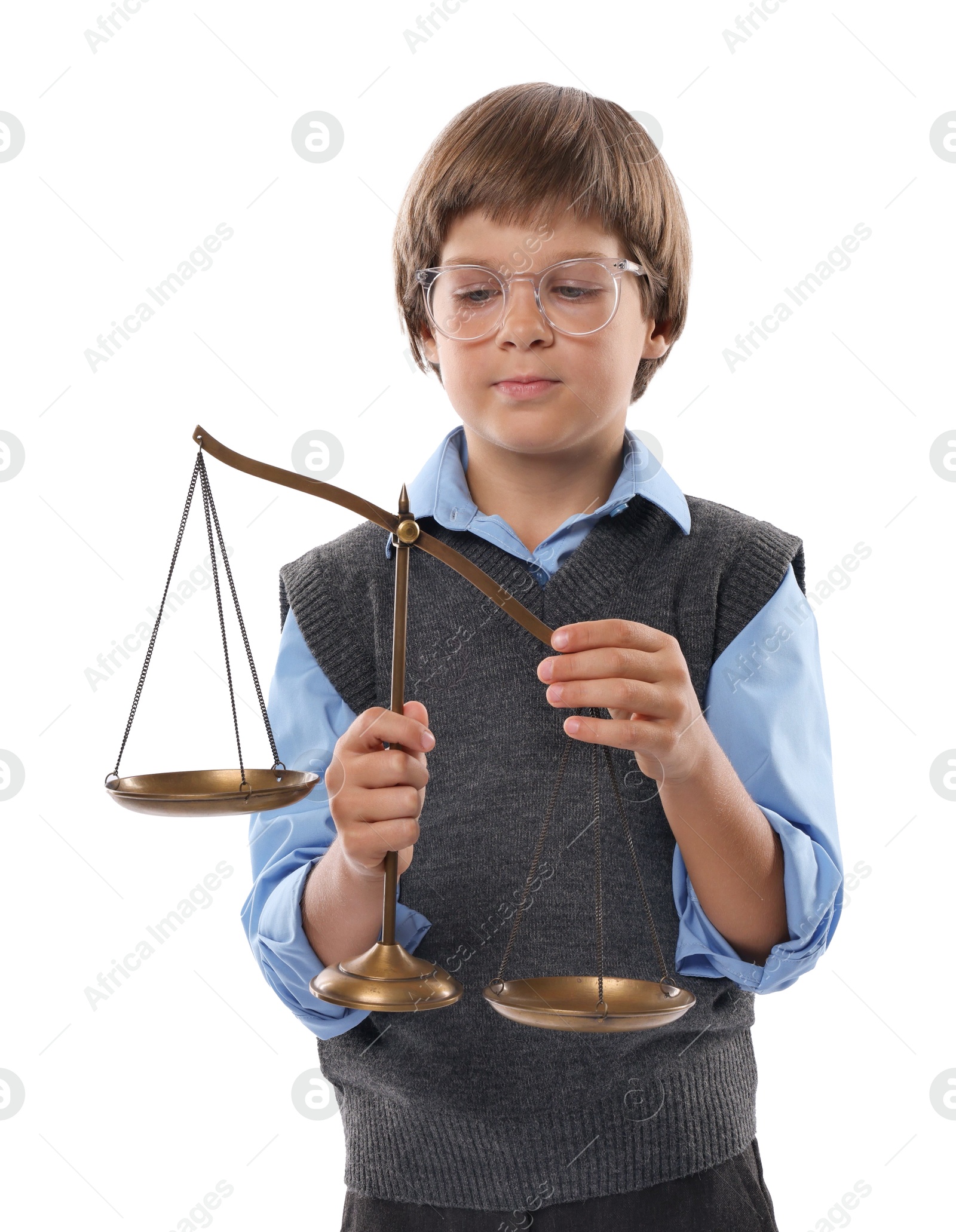 Photo of Choice of profession. Little boy in glasses with scales of justice pretending to be lawyer on white background