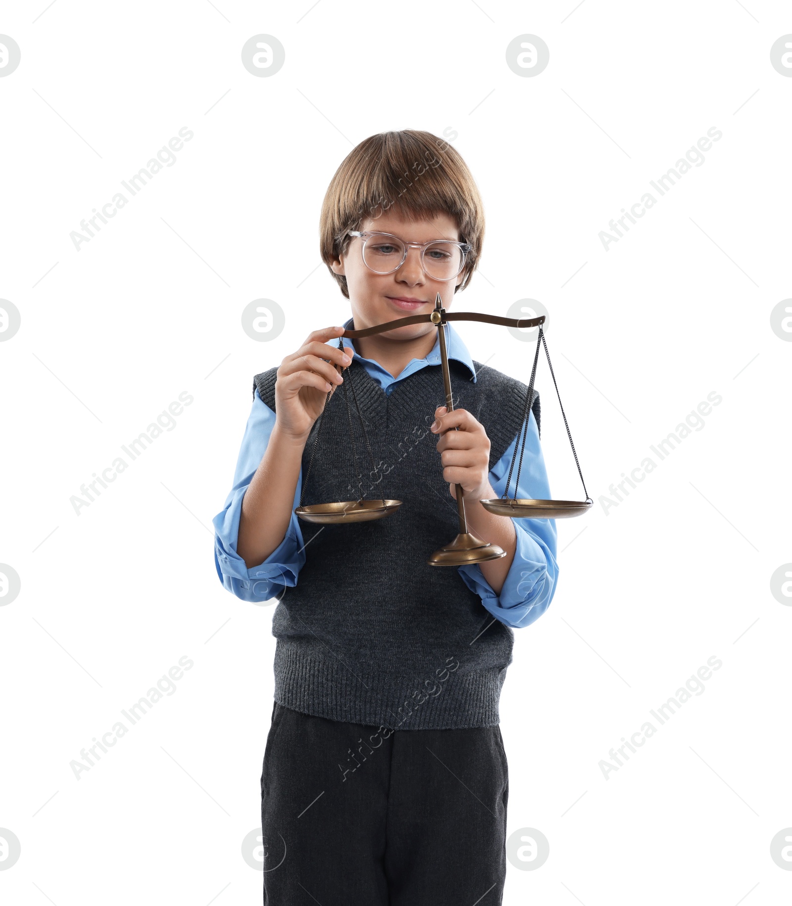 Photo of Choice of profession. Little boy in glasses with scales of justice pretending to be lawyer on white background