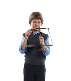 Photo of Choice of profession. Little boy in glasses with scales of justice pretending to be lawyer on white background