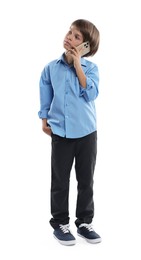 Photo of Choice of profession. Little boy talking by smartphone pretending to be businessman on white background
