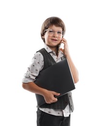 Photo of Choice of profession. Little boy in glasses talking by smartphone pretending to work with laptop on white background