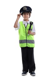 Photo of Choice of profession. Little boy in uniform with flashlight pretending to be policeman on white background