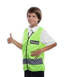 Photo of Choice of profession. Little boy in uniform showing thumbs up pretending to be policeman on white background