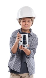 Photo of Choice of profession. Little boy in hardhat with building model pretending to be architect on white background