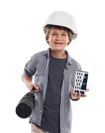 Photo of Choice of profession. Happy little boy in hardhat with building model and drawing tube pretending to be architect on white background