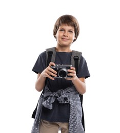 Photo of Choice of profession. Little boy with camera and backpack pretending to be photographer on white background