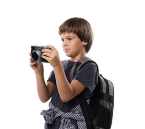 Photo of Choice of profession. Little boy with camera and backpack pretending to be photographer on white background