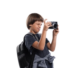 Photo of Choice of profession. Little boy with camera and backpack pretending to be photographer on white background