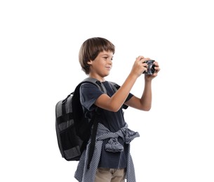 Photo of Choice of profession. Little boy with camera and backpack pretending to be photographer on white background