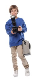 Photo of Choice of profession. Little boy with camera and bag pretending to be photographer on white background
