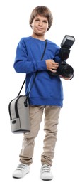 Photo of Choice of profession. Little boy with camera and bag pretending to be photographer on white background