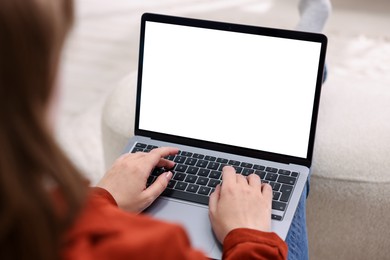 Photo of Woman working with laptop indoors, closeup. Mockup for design