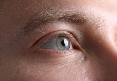 Photo of Closeup view of man with beautiful eyes