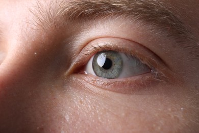 Photo of Closeup view of man with beautiful eyes