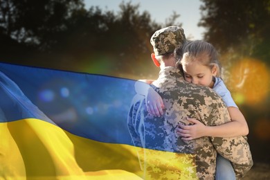 Image of Military man and his happy daughter outdoors. Double exposure with flag of Ukraine