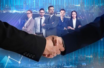 Image of Business partners shaking hands against group of people. Cityscape and graphs on background