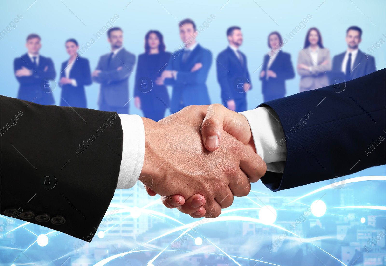 Image of Business partners shaking hands against group of people. Cityscape on background