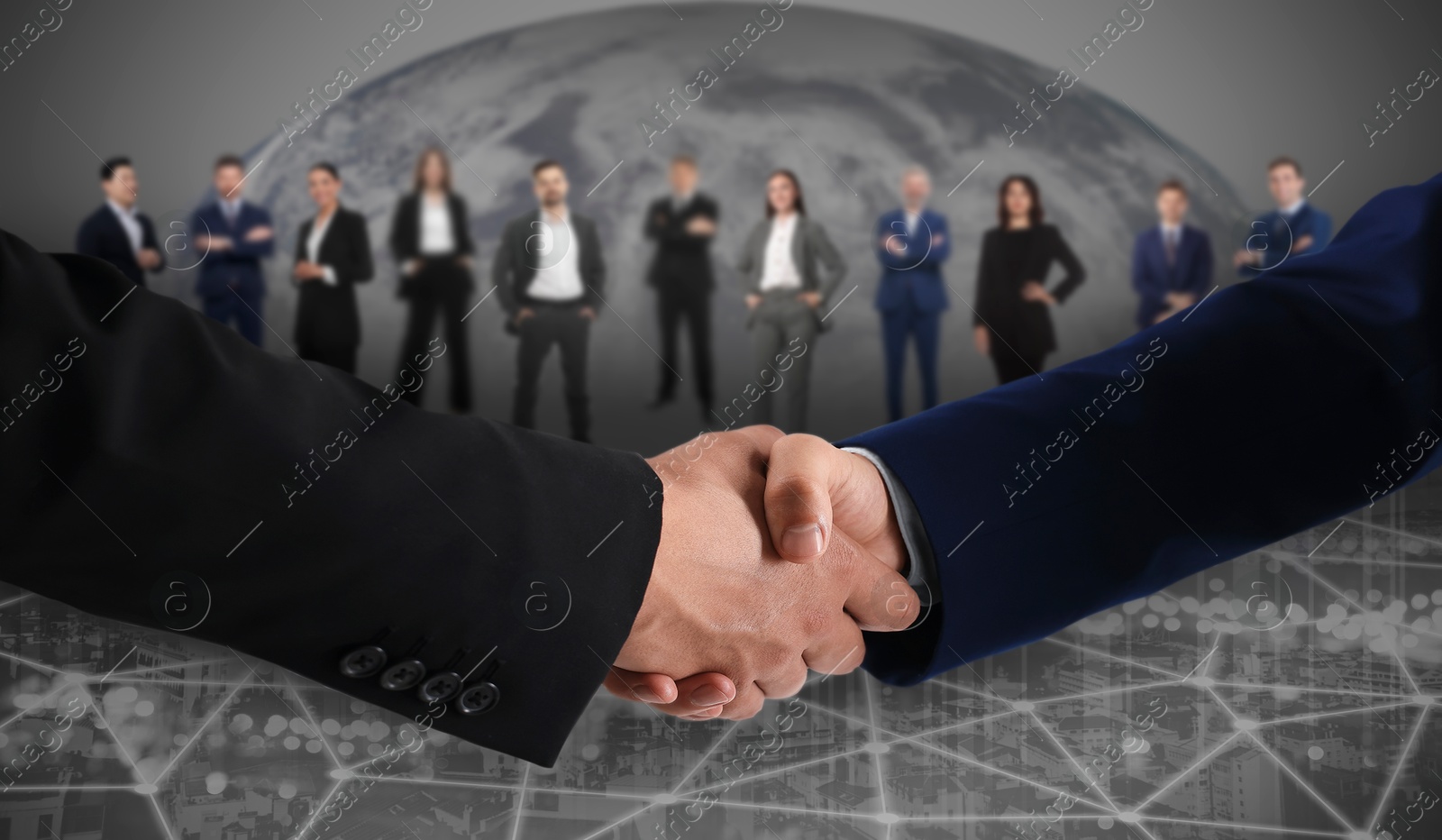 Image of Partners shaking hands against business people. Globe on background