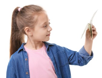 Photo of Little girl with pocket money on white background