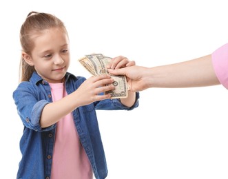 Photo of Mother giving her daughter pocket money on white background, closeup