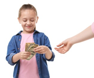 Photo of Mother giving her daughter pocket money on white background, closeup