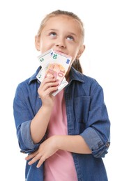 Photo of Little girl with pocket money on white background