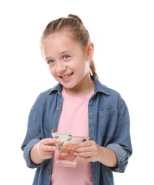 Photo of Little girl with pocket money on white background