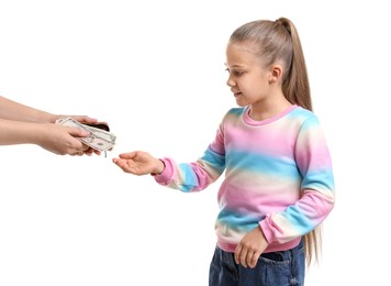 Photo of Mother giving her daughter pocket money on white background, closeup