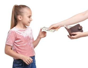 Photo of Mother giving her daughter pocket money on white background, closeup