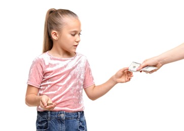 Photo of Mother giving her daughter pocket money on white background, closeup