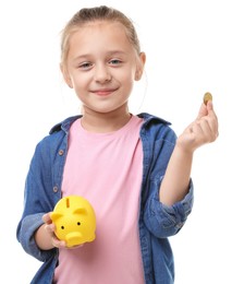 Photo of Little girl with pocket money and piggy bank on white background