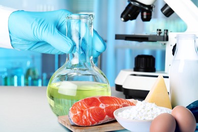 Image of Food analysis. Laboratory worker examining quality of fresh products