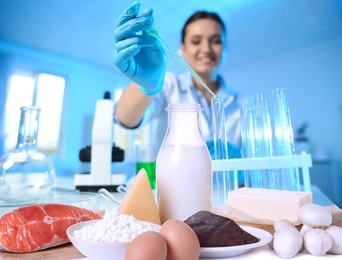Image of Food analysis. Laboratory worker examining quality of fresh products