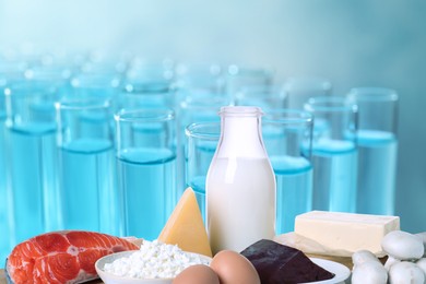 Image of Food laboratory analysis. Test tubes and fresh products