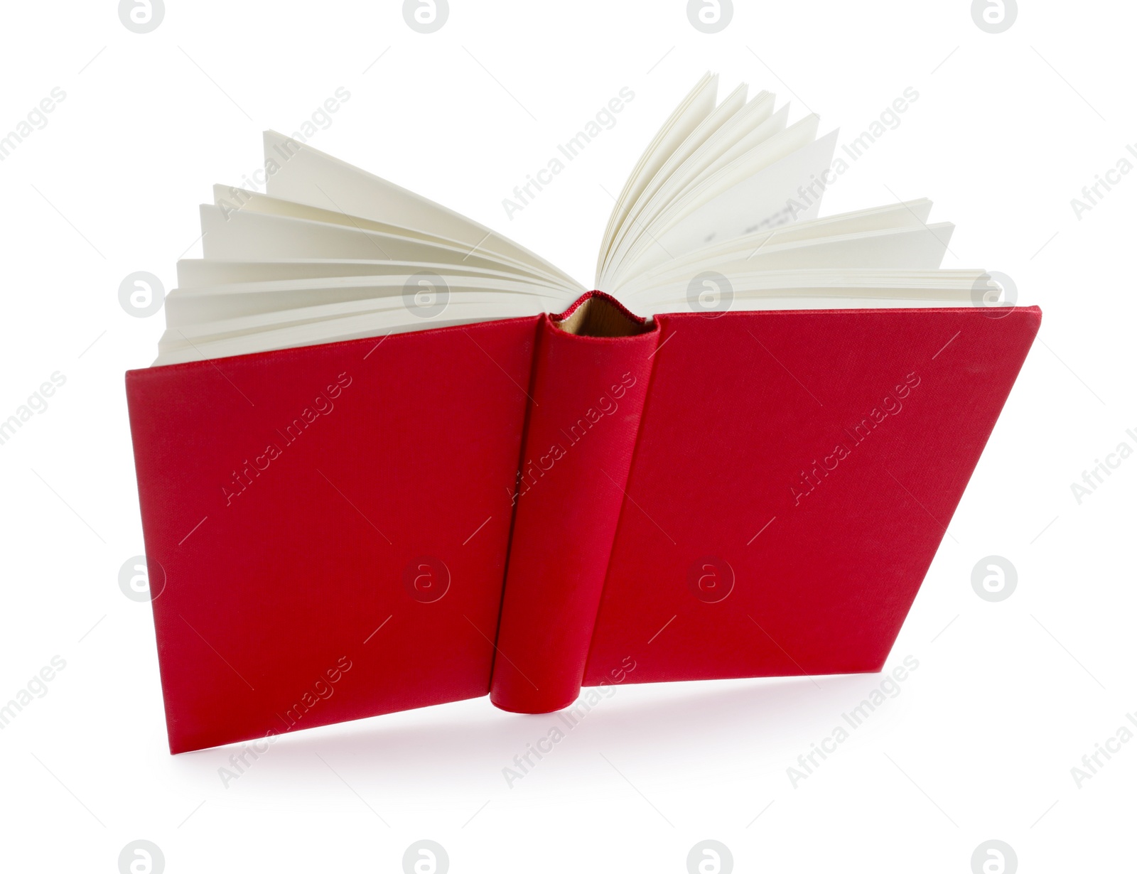 Photo of Open red hardcover book isolated on white