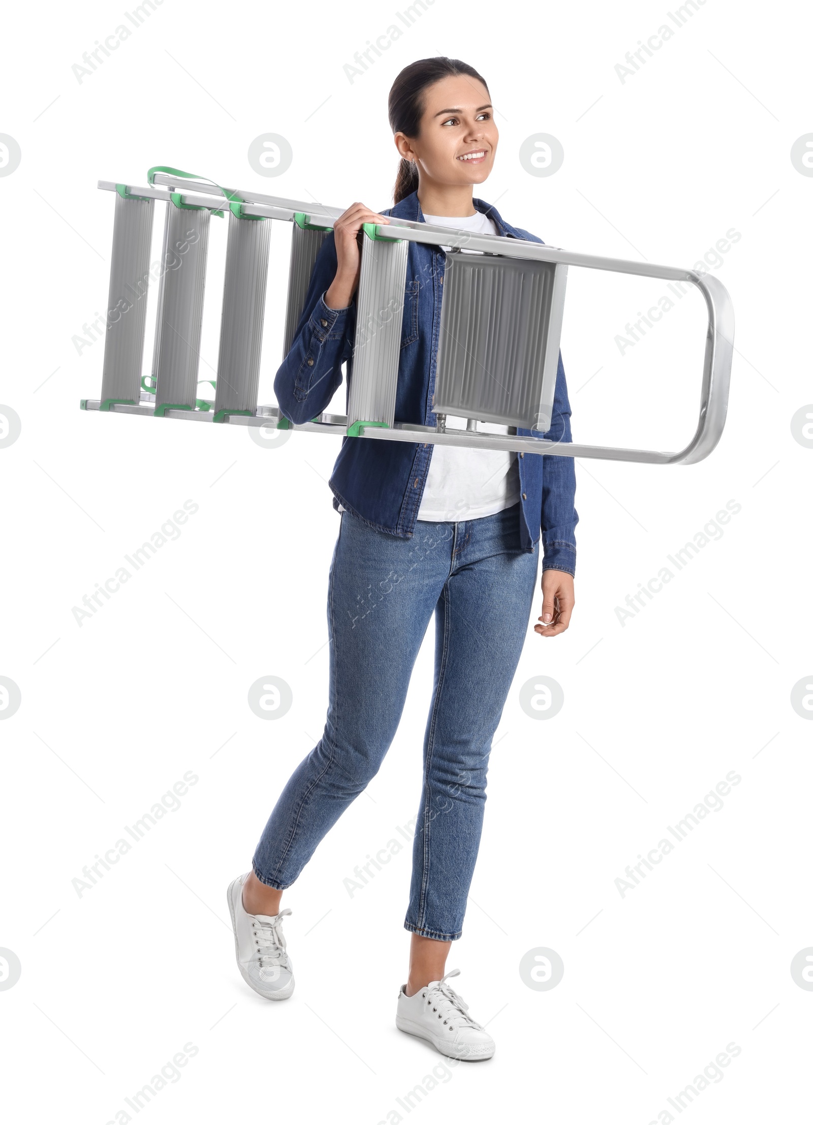 Photo of Young woman holding metal ladder on white background