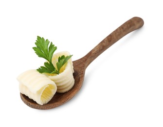 Tasty butter curls and fresh parsley in spoon isolated on white