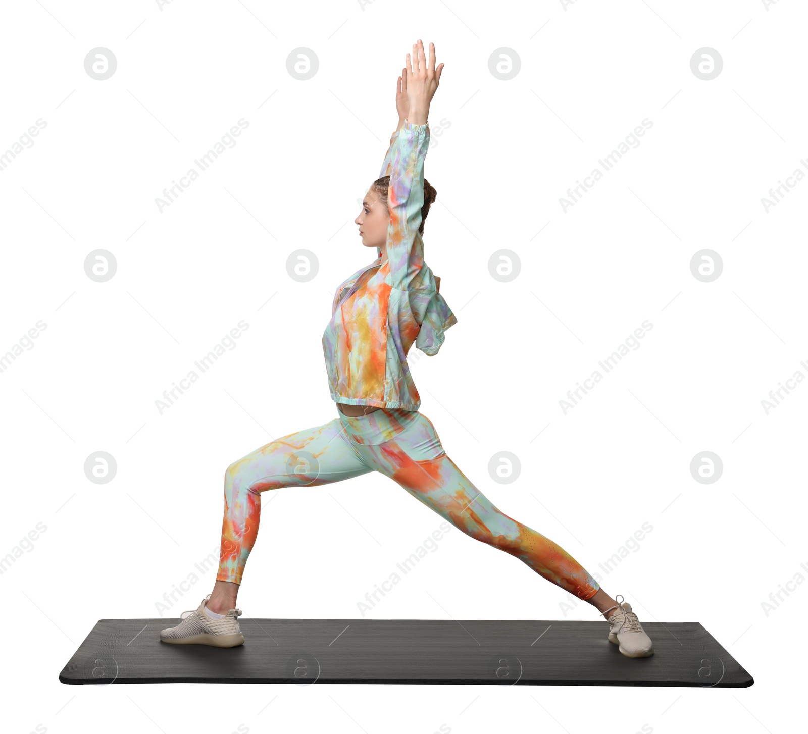 Photo of Young woman practicing yoga on white background