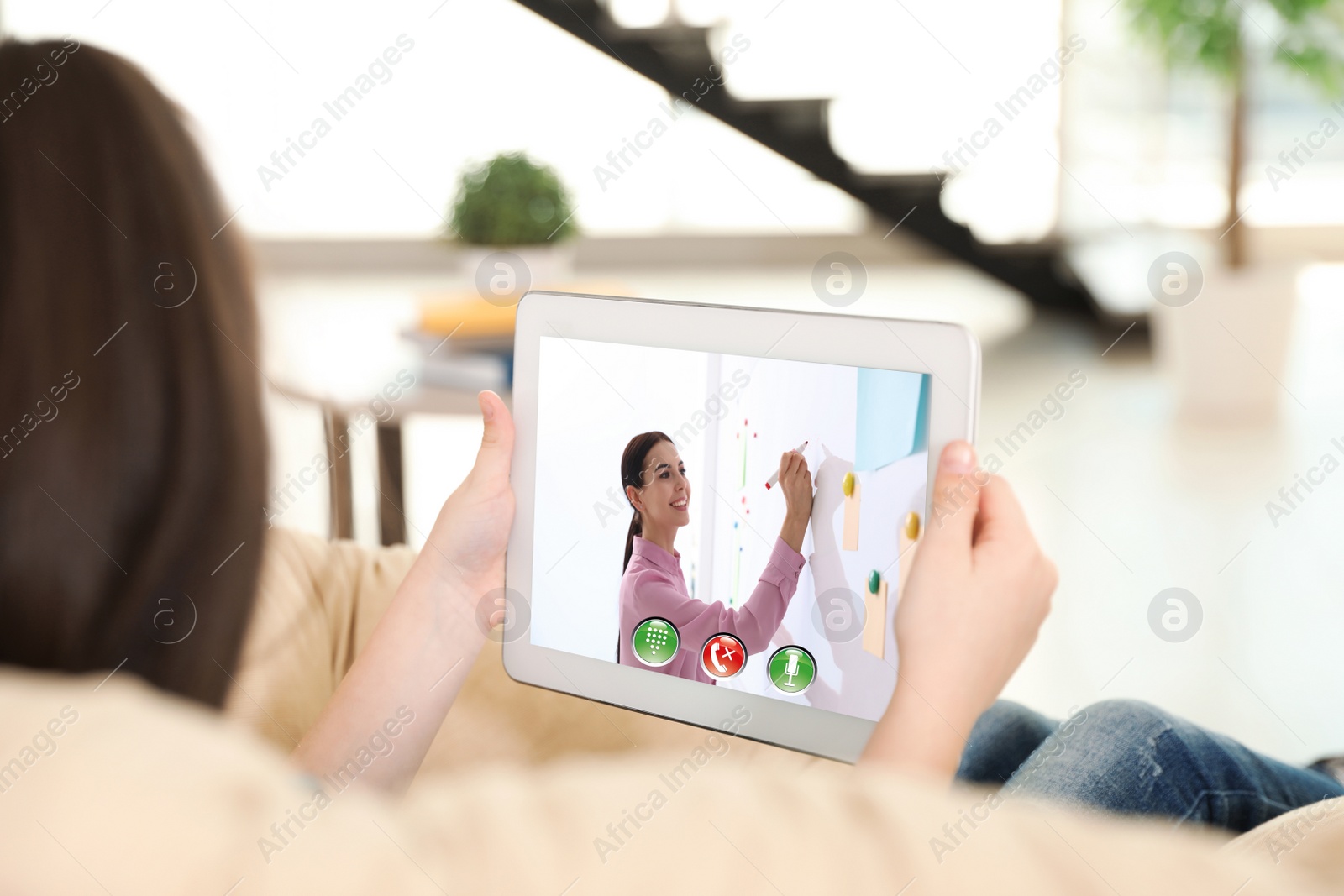 Image of Distance learning, studying at home. Girl having online school lesson during quarantine and lockdown due to Covid-19 pandemic