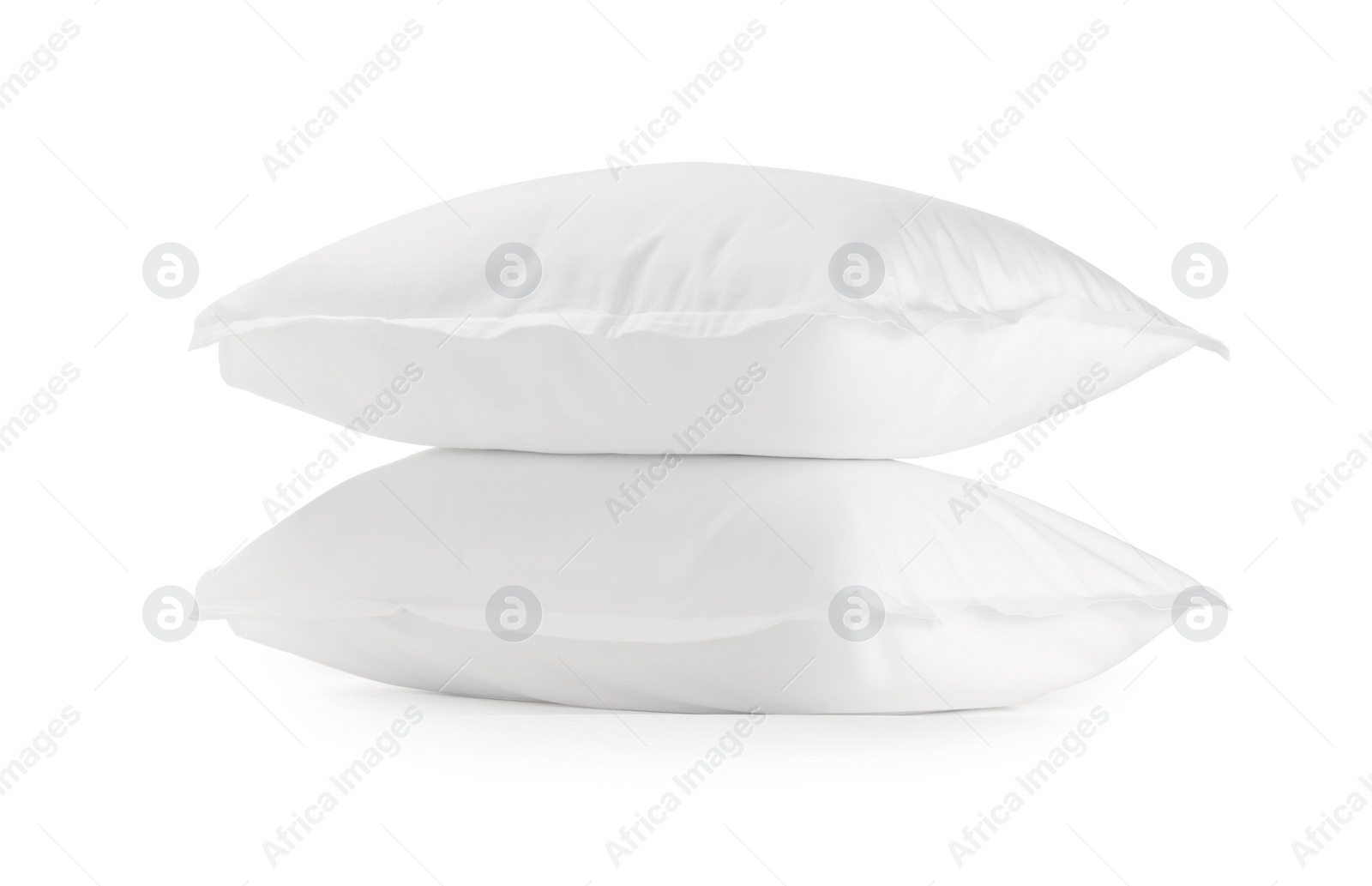 Photo of Two new soft pillows isolated on white