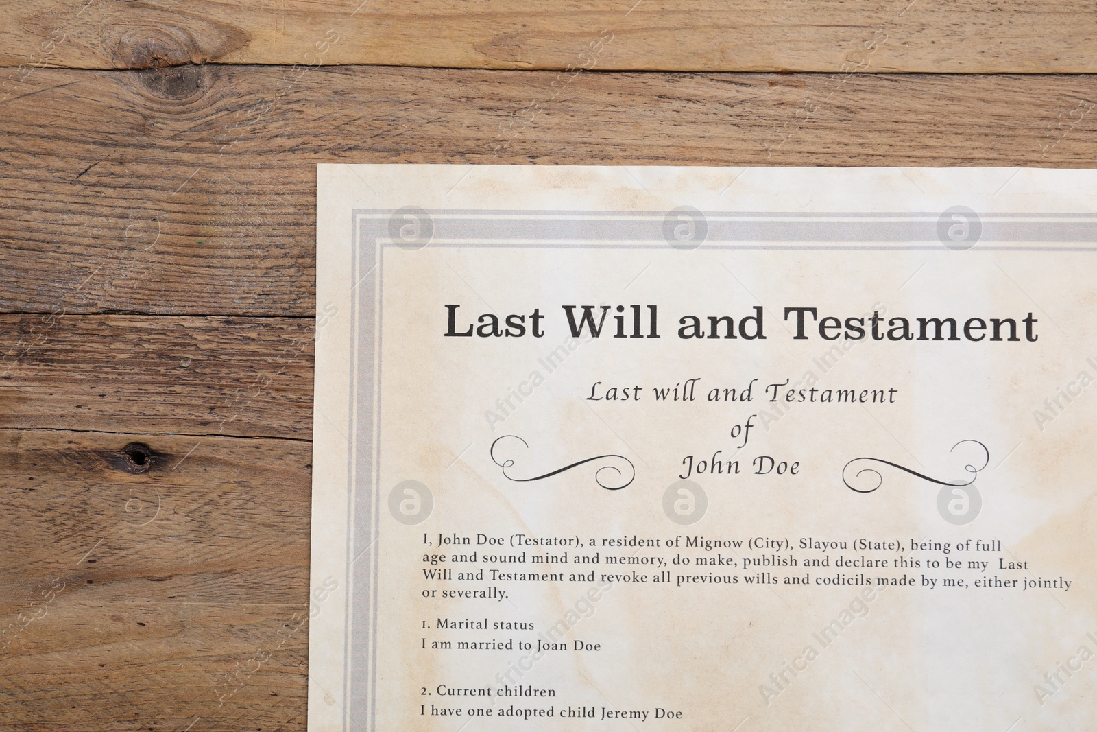 Photo of Last Will and Testament on wooden table, top view