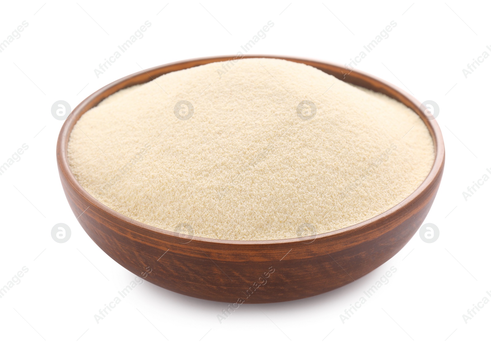 Photo of Bowl of uncooked organic semolina isolated on white