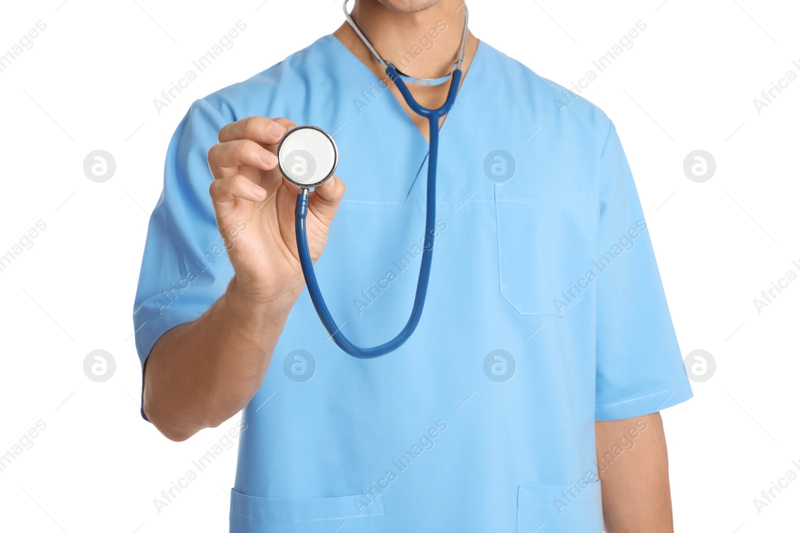 Photo of Male doctor with stethoscope on white background, closeup. Medical object