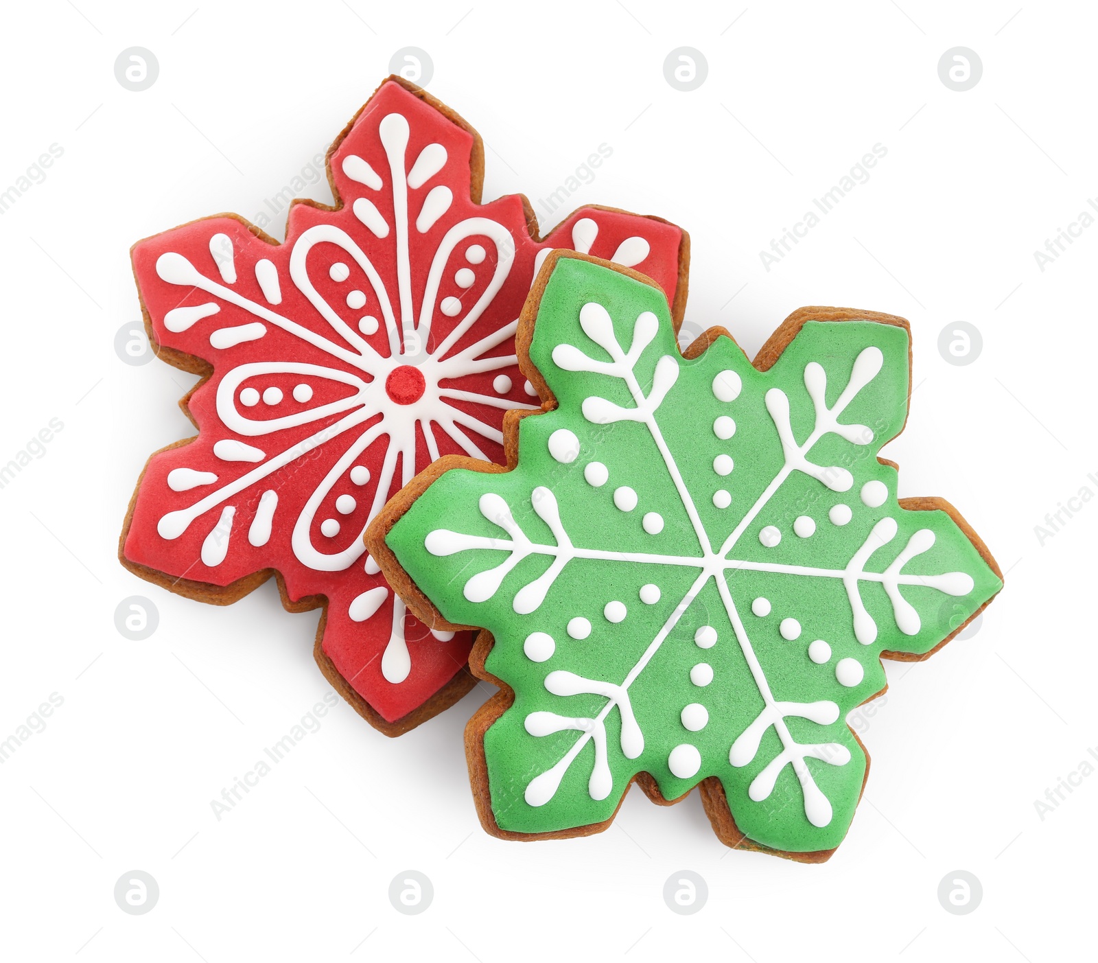 Photo of Tasty Christmas cookies in shape of snowflakes isolated on white, top view