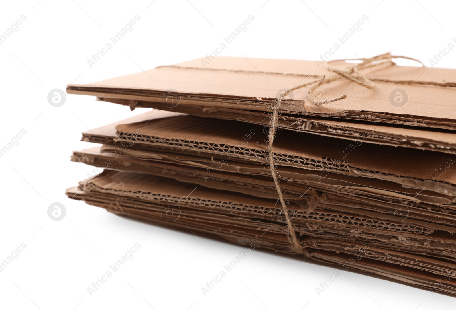 Photo of Waste paper tied with twine isolated on white