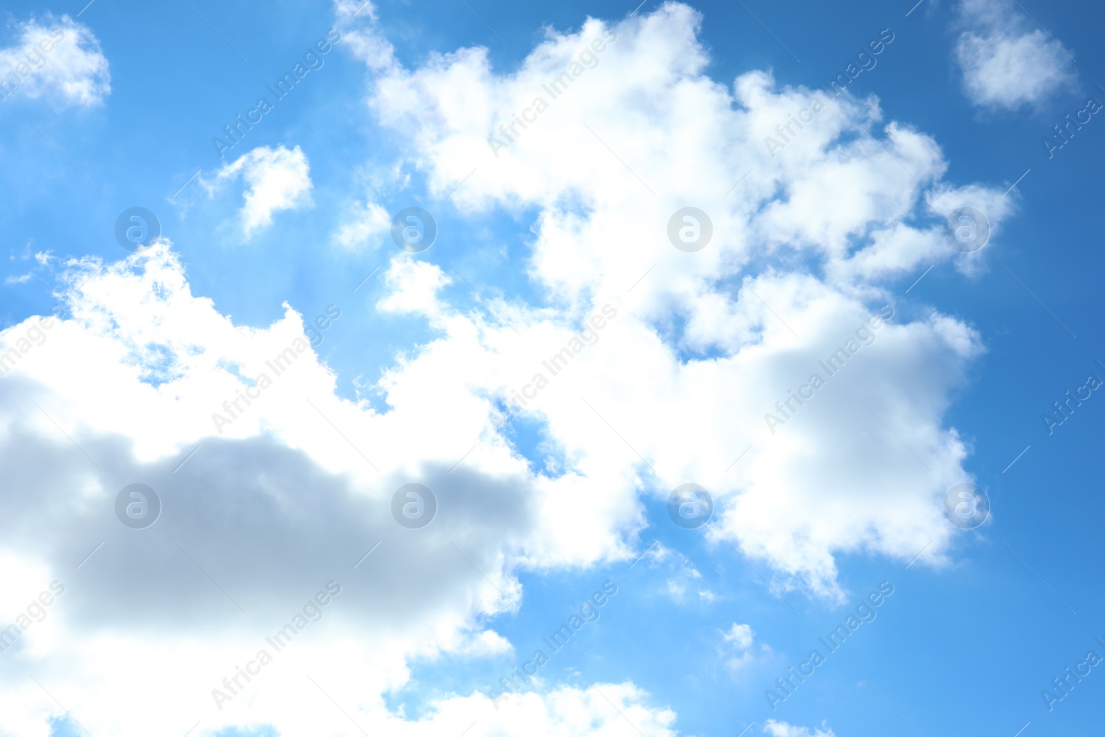 Photo of View of beautiful blue sky with fluffy clouds