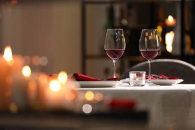 Table setting for romantic dinner in restaurant