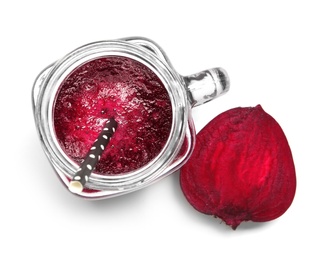 Mason jar of beet smoothie on white background, top view