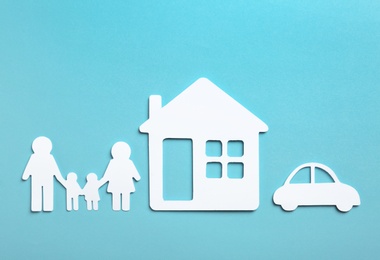 Photo of Paper silhouettes of family, house and car on color background, flat lay. Life insurance concept