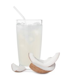 Photo of Glass of coconut water, ice cubes and nut isolated on white